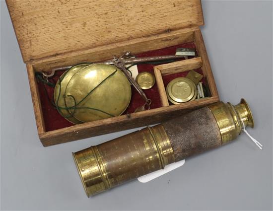 A brass three drawer telescope and set of brass scales